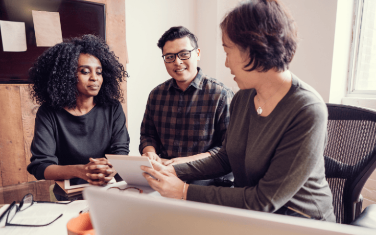 Man and woman doing their taxes with an accountant