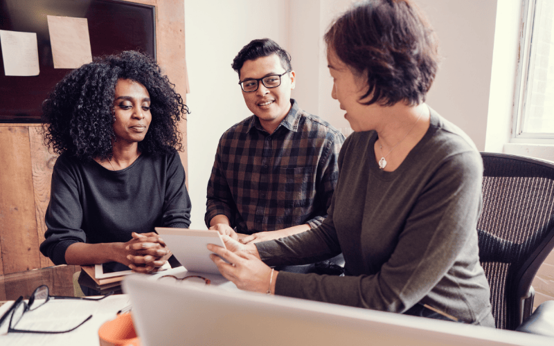 Man and woman doing their taxes with an accountant